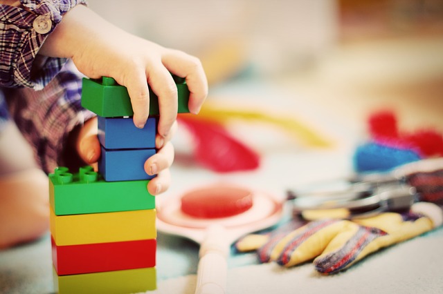 toddler playing with toys